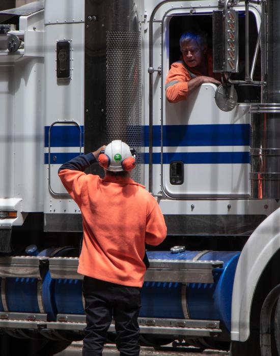 Garbage Truck Man talking | Xero Waste Services | State of the Art Commercial and Residential Garbage Disposal Service